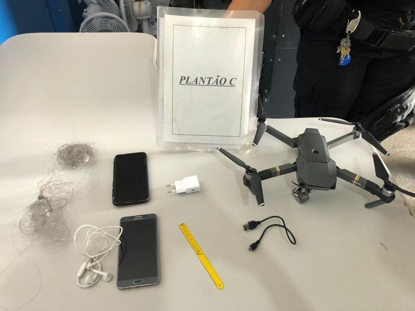 Drone com celulares é abatido na Penitenciária Feminina de Cuiabá. (Foto: Sistema Penitenciário)